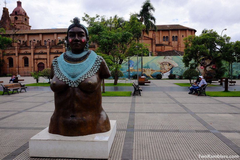 Statue of a Guarani woman with turquoise jewlery