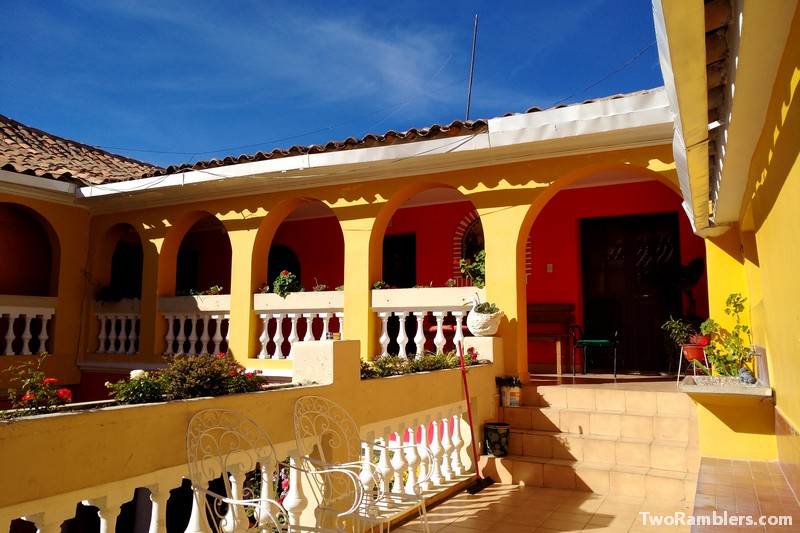 Terrace of a yellow building in the sun