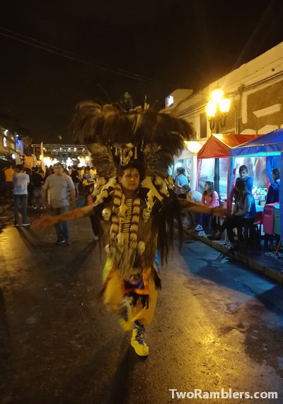 Man in costume with skulls and bones