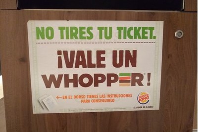 Burger King advertisement on a trash bin