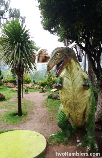 Green dinosaur statue